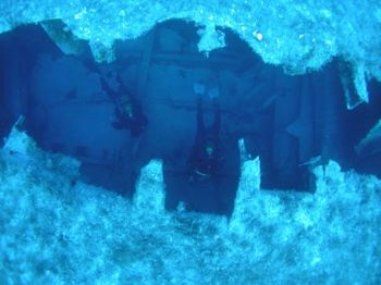 TAKEN IN MALTA ON THE SS.UM AL FARUDE. DIVERS INSIDE THE ... by Kevin Hunkin 